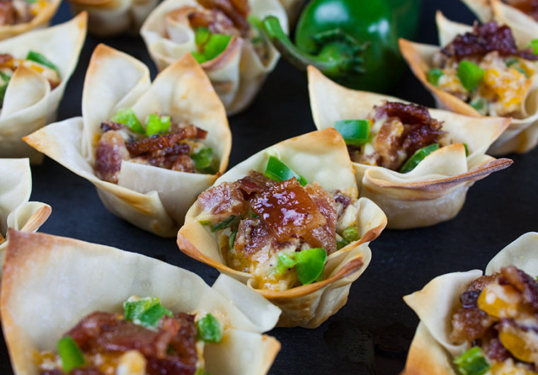 Candied Bacon Jalapeno Poppers - Jalapeno Poppers ramped up with candied bacon. You have sweet, savory, spicy and all the wonderful various textures which gives you the perfect bite. Amazingly delicious!
