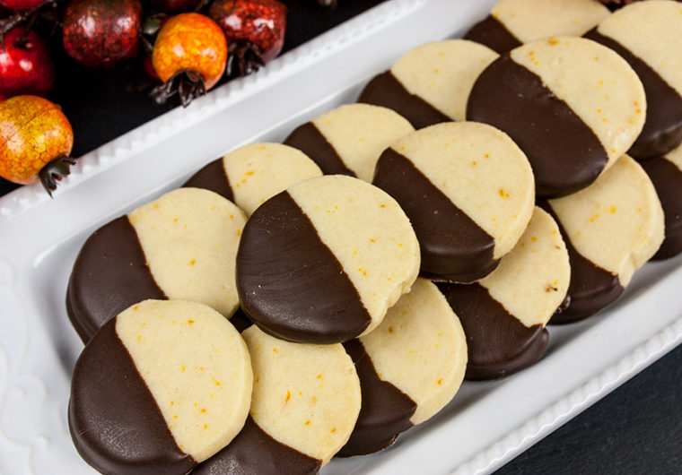 cookies stacked on white platter