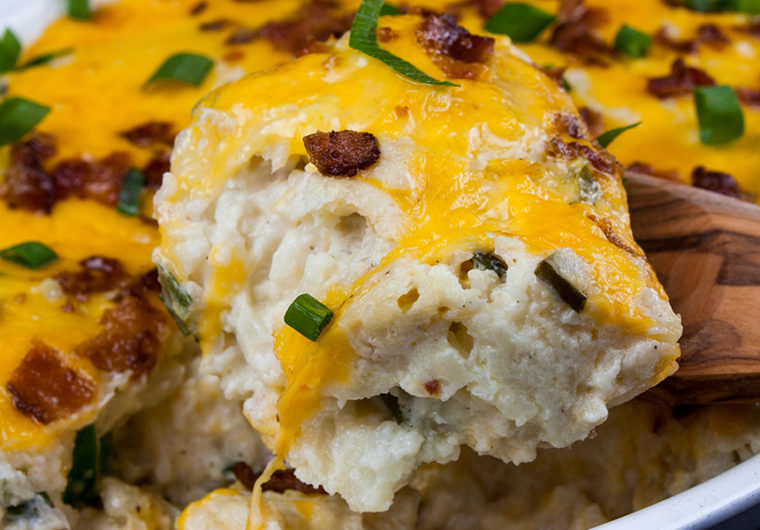 Loaded Cauliflower Mash Casserole - Perfect swap out for twice baked potatoes. It's unbelievably tasty and full of the loaded baked potato flavors you crave!
