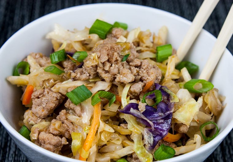 Pork Egg Roll Bowl - Same great flavor as a traditional egg roll just without the wrapper. It's also known as "crack slaw". Super easy to make with budget-friendly ingredients.