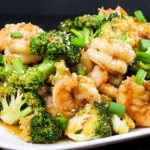 Shrimp and Broccoli Stir Fry on a white serving dish.