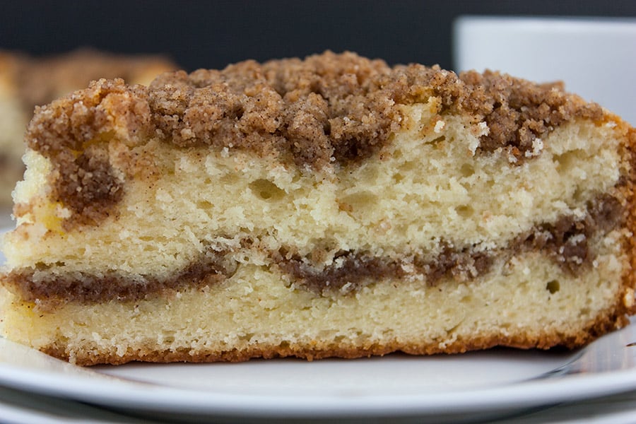 Cinnamon Crumb Coffee Cake on a white plate.