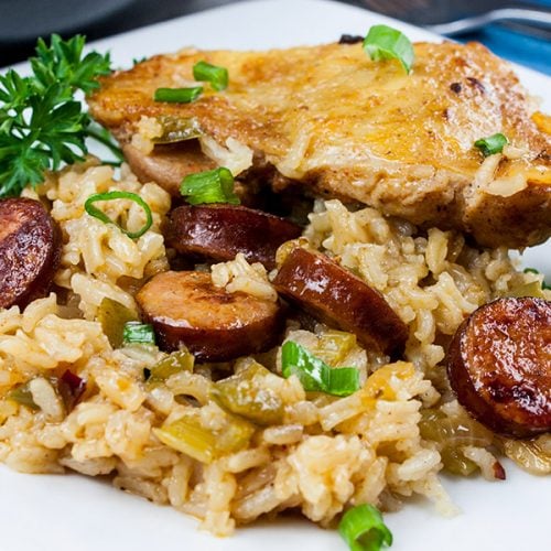 One Pan Chicken and Dirty Rice - Add a little Cajun spice to your dinner tonight! Spicy, creamy, delicious and ready in 30 minutes!
