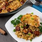 One pan chicken and dirty rice served on a white plate.