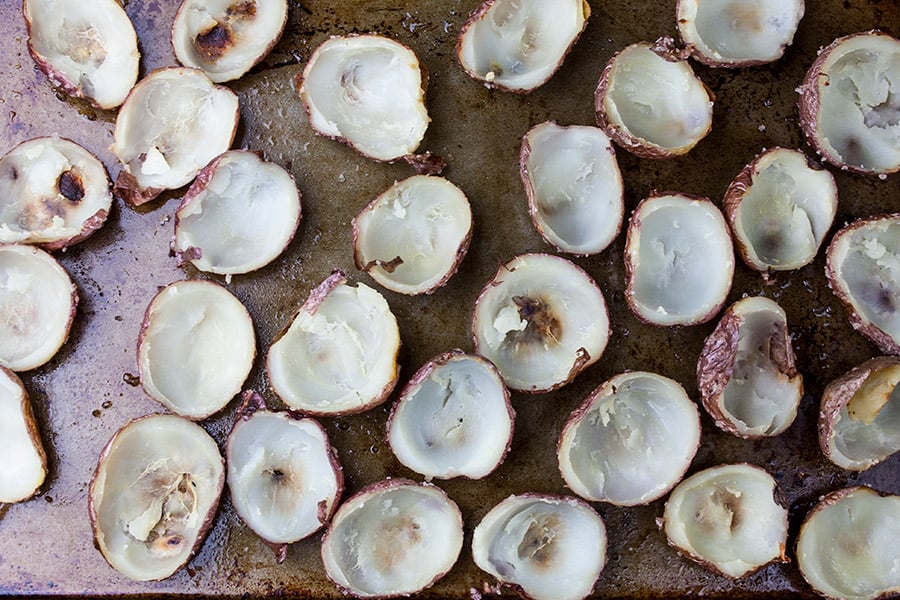 Deviled Potato Bites - potato skins scooped out on a baking sheet