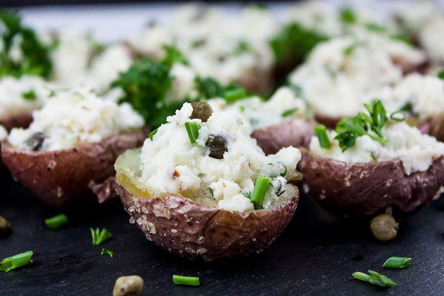 Deviled Potato Bites with a chive garnish.