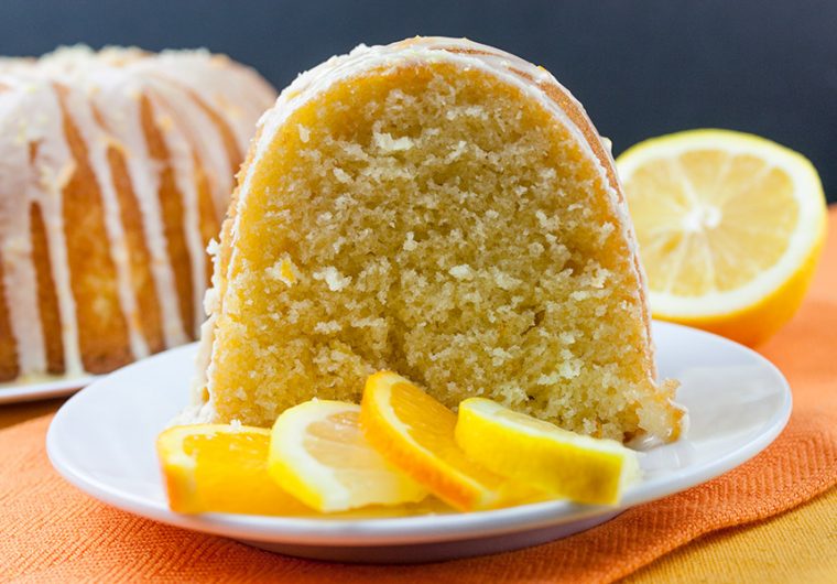 Lemon-Orange Pound Cake - Buttery, soft pound cake laced with lemon and orange zest and topped with a delicious citrusy glaze. Bursting with citrus flavors this cake just screams spring dessert!