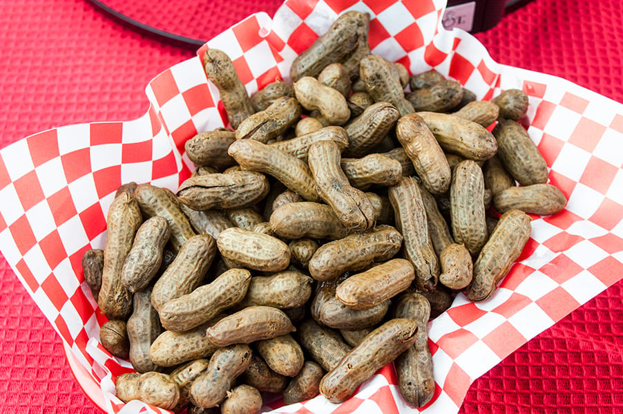 Slow Cooker Boiled Peanuts in a red basket.