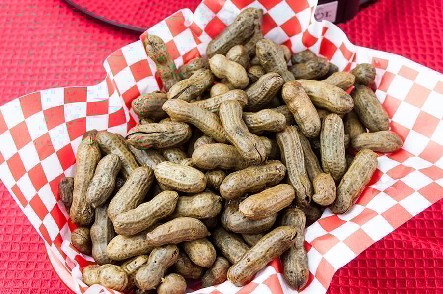 Slow Cooker Boiled Peanuts in a red basket.