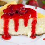 Smooth and Creamy Cheesecake with a strawberry topping.