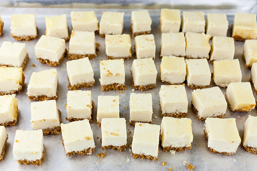 Chocolate Covered Cheesecake Bites - cheesecake cut into 1-inch squares