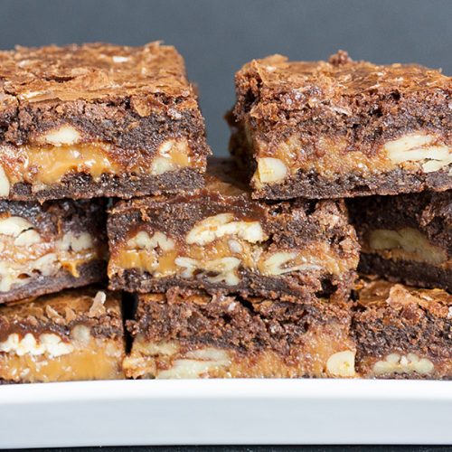 Ultimate Turtle Brownies - Deliciously rich fudgy brownies oozing with creamy caramel and loaded with pecans! Easy to make and great for parties.