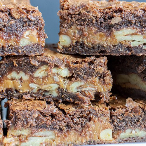 Turtle brownies stacked up.
