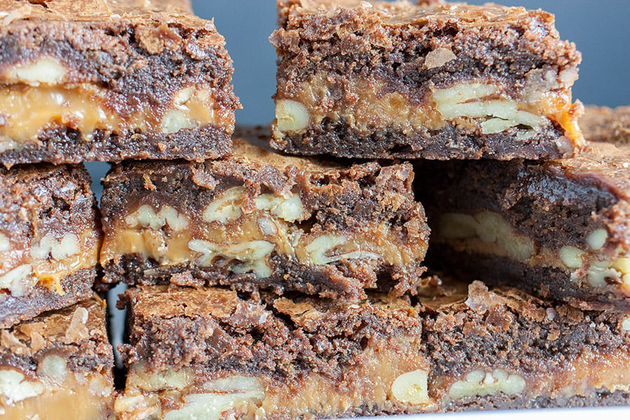 Turtle brownies stacked up.