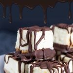 Chocolate Covered Cheesecake Bites - An easy ultimate party treat! A cool, creamy, rich mini cheesecake bite drizzled with chocolate. Perfect for barbecues, holidays or parties of any kind! #dessert #recipe #summer #sweet