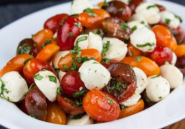 Fresh Tomato Mozzarella Salad - A light no-cook meal or side dish perfect during the summer months. Loaded with ripe, juicy, flavor-popping tomatoes, creamy mozzarella, and fresh basil.