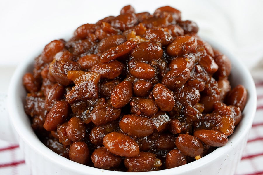 Slow Cooker Boston Baked Beans in a white ramekin.