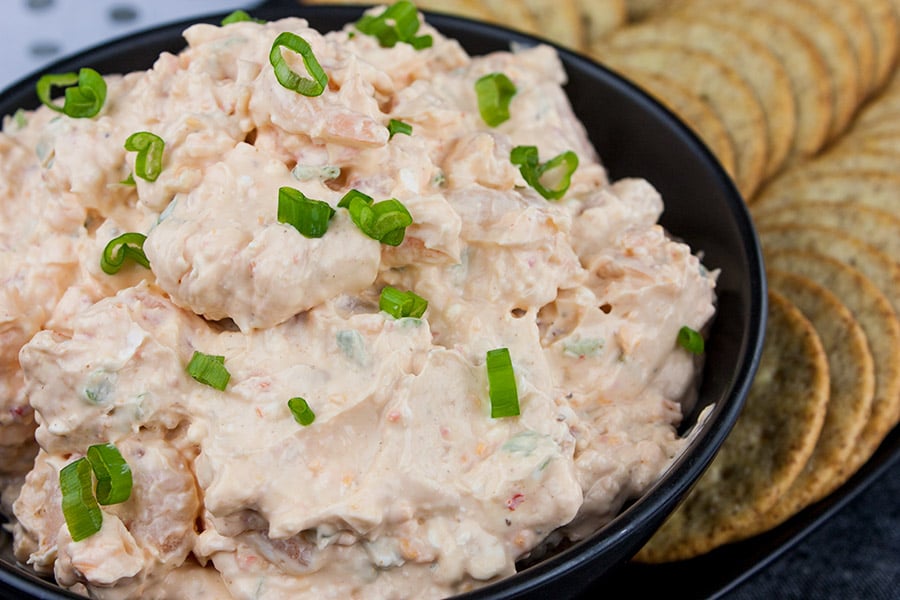 Easy Cold Shrimp Dip - A perfect appetizer or snack. Thick, creamy and full of shrimp flavor. It's quick, easy and definitely a crowd-pleaser!