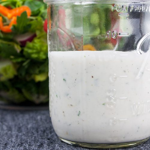 Southern Buttermilk Dressing - So simple to make you will never purchase store-bought again! A creamy, tangy buttermilk dressing flavored with fresh herbs that's great on salads, pasta or a vegetable dip.