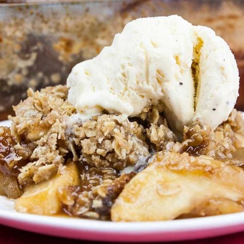 Classic Apple Crisp - Thinly sliced cinnamon-spiced apples baked to perfection and topped with a sweet crunchy oat crumble. Easy to make and a no-fuss way to apple pie flavors.