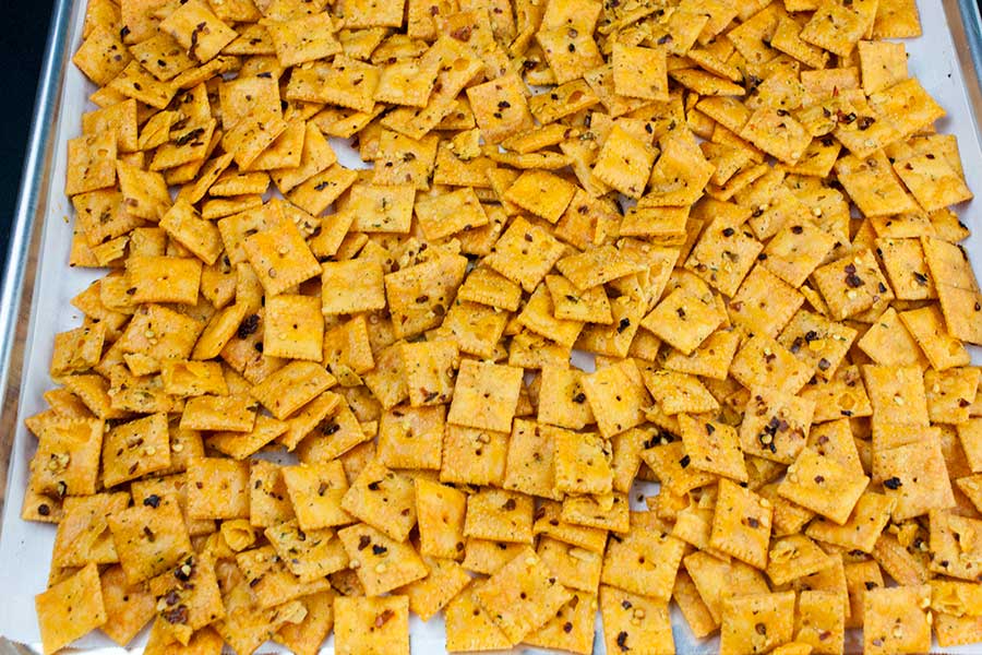 Firecracker Cheez-Itz - crackers on a parchment lined baking sheet