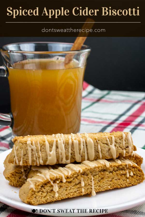 Spiced Apple Cider Biscotti - The perfect fall biscotti recipe for your cookie jar! Boiled apple cider gives this biscotti an intense apple flavor. #cookies #fall #dessert #thanksgiving #christmas #recipe