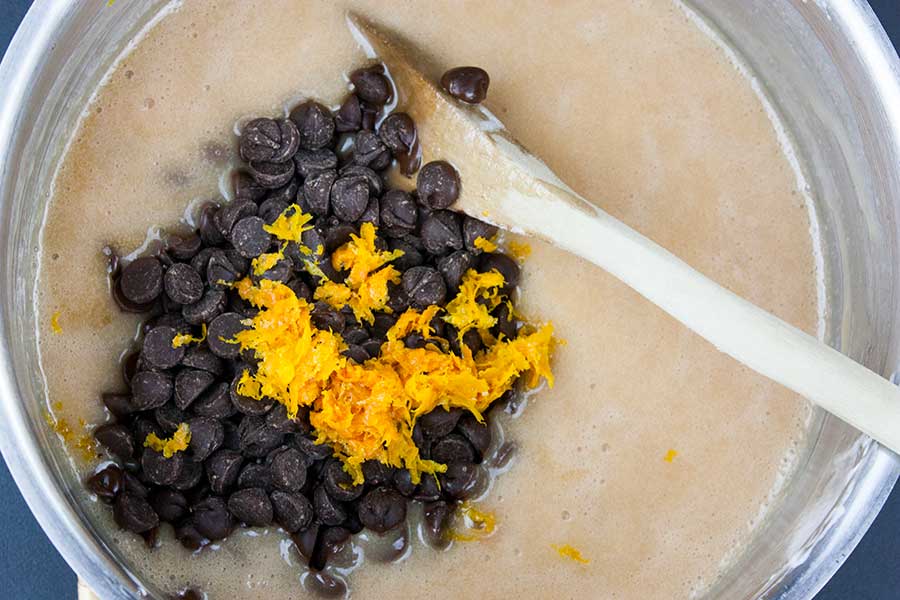 Chocolate Orange Fudge -marshmallow creme, sugar, evaporated milk, and butter boiled in a heavy-bottom saucepan with the chocolate chips and orange zest added