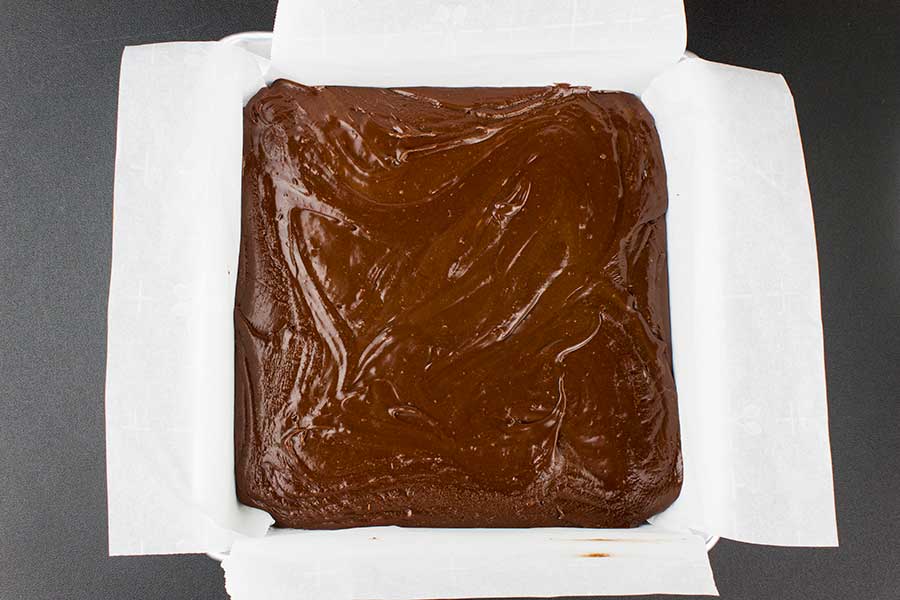 Chocolate Orange Fudge - cooked fudge in a parchment lined baking pan