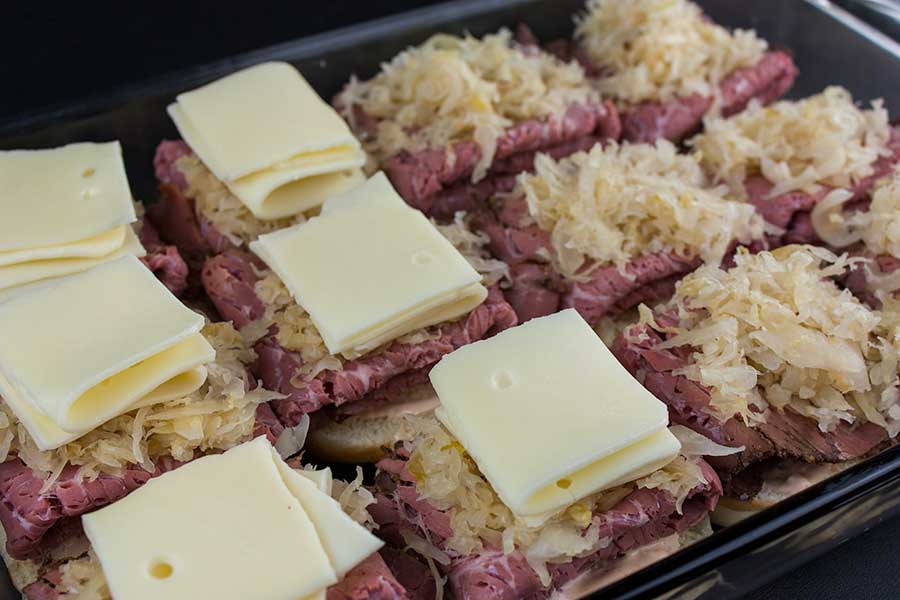 Making pastrami and swiss cheese sliders