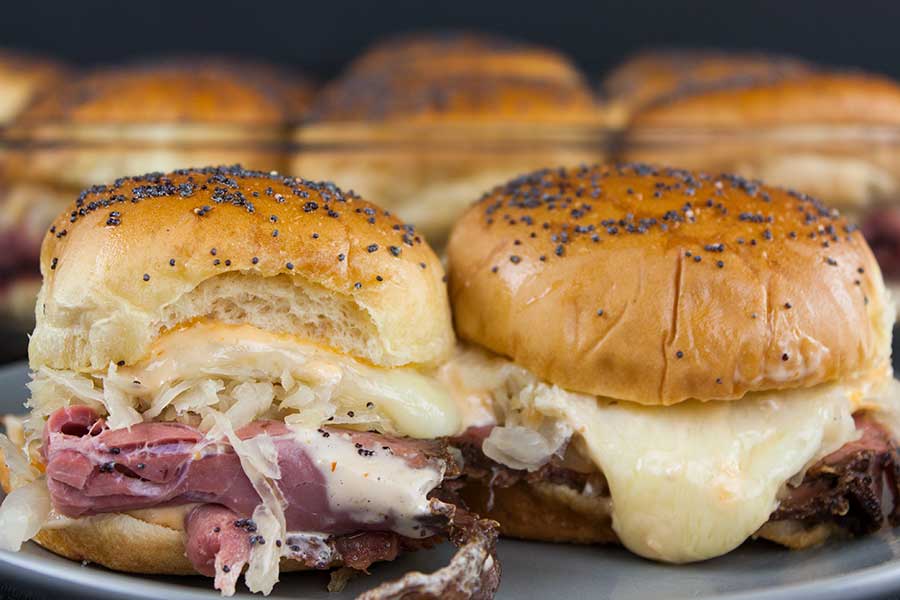 Pastrami And Swiss Cheese Sliders - This pastrami and swiss cheese slider recipe delivers all the flavors. It's perfect for any kind of get-together, movie night, or tailgate party.