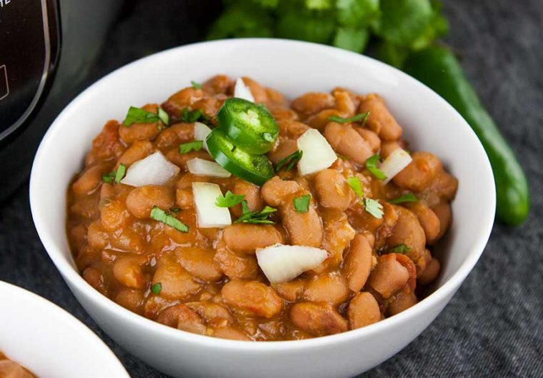 Ninja Foodi Mexican Pinto Beans (Charro Beans) - Such an easy recipe to spice up pinto beans. Perfect side dish to any Mexican meal! Hearty enough to be the main meal.