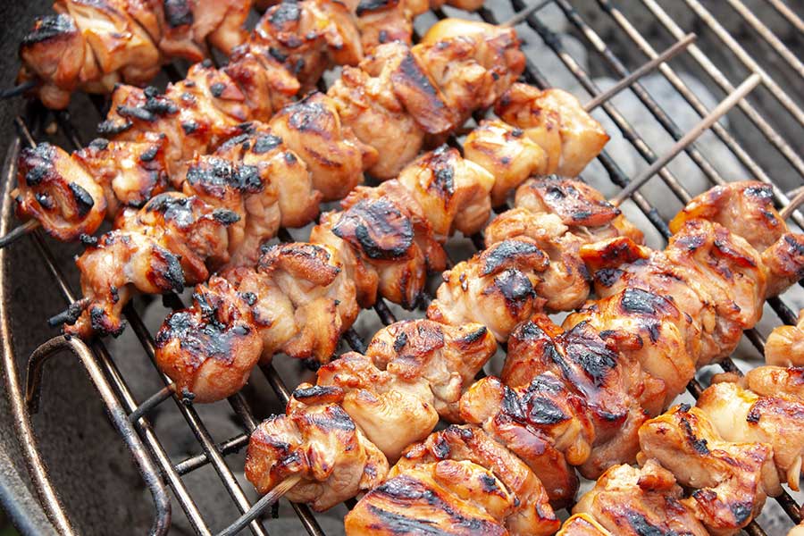 Filipino Chicken Kebabs - Tired of your standard grilled chicken? You have to try these deliciously flavorful Filipino chicken kebabs. Quick and easy and bursting with Asian flavors. Filipino Chicken Kebabs on the grill