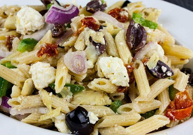 Greek Pasta Salad - A light, fresh, flavor-packed salad perfect for summer or any time of the year! Great to feed a crowd.