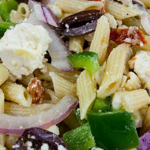 Greek Pasta Salad - A light, fresh, flavor-packed salad perfect for summer or any time of the year! Great to feed a crowd.