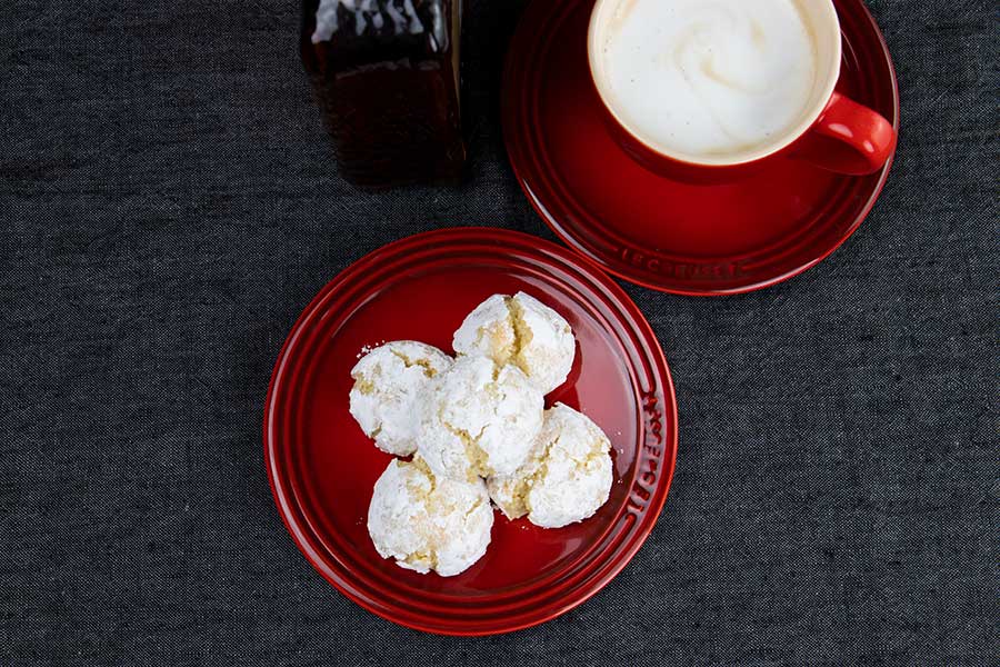 Ingredients for Amaretti Cookies in red bowl