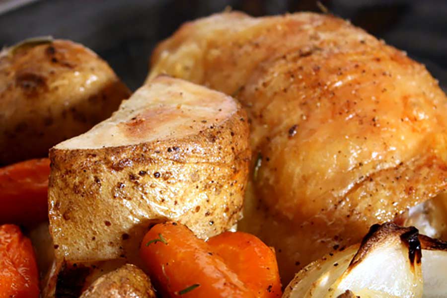 Roasted chicken thighs and vegetables.