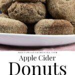 apple cider donuts on white platter