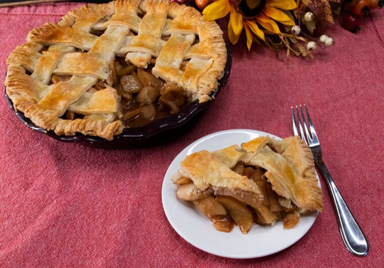 slice of apple pie on white plate