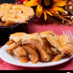 slice of apple pie on white plate