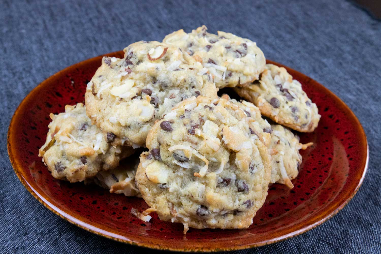 almond joy cookies on red plate