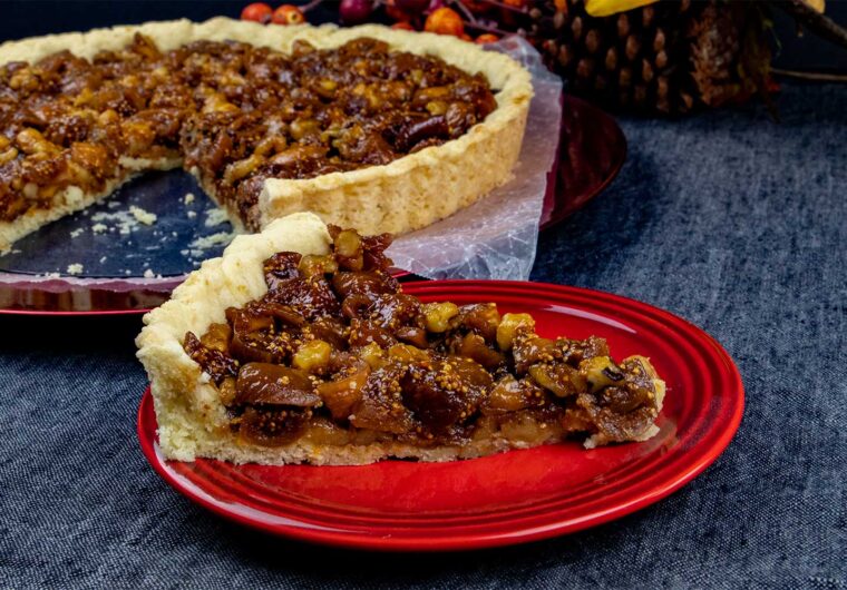 slice of fig tart on red plate