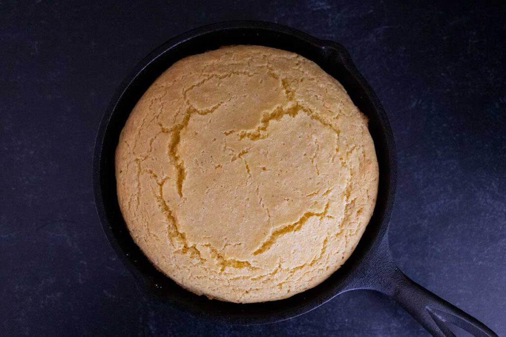 Buttermilk cornbread in a cast iron skillet.