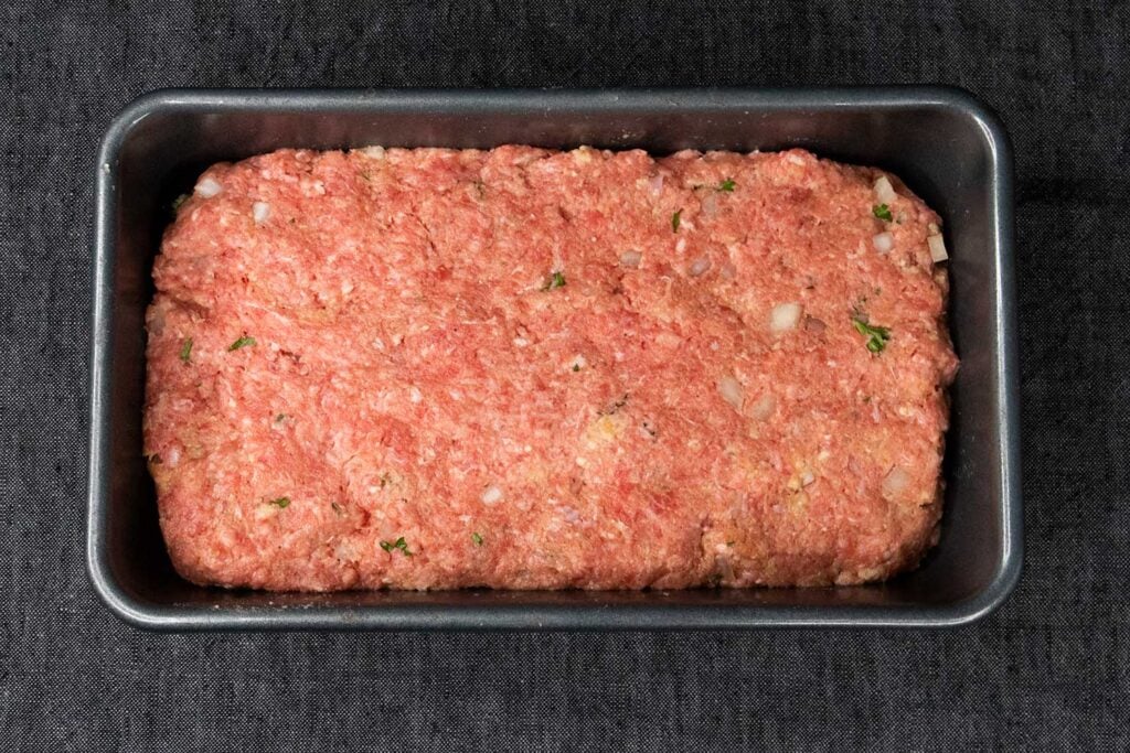 meatloaf pressed into a loaf pan