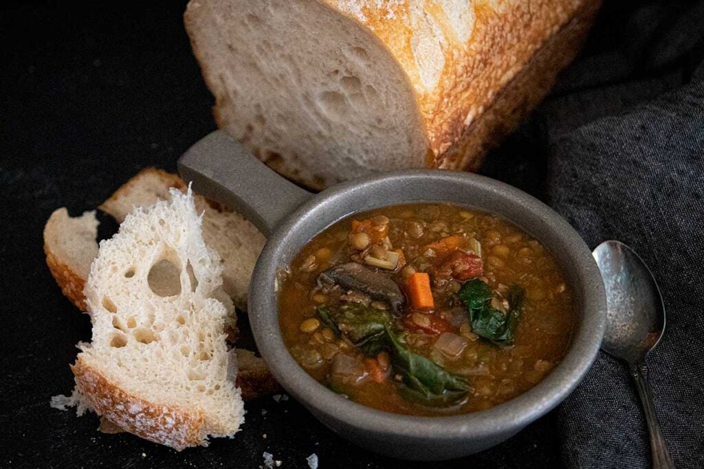 Lentil soup with bread.