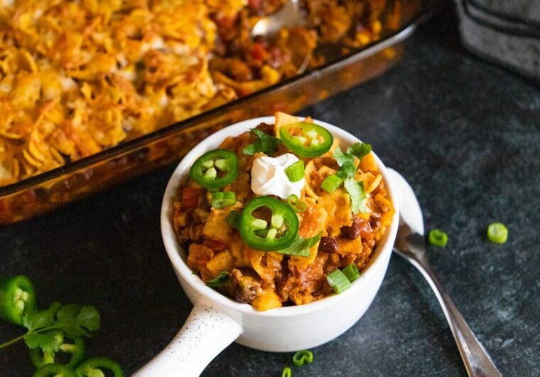 Frito pie casserole in a white bowl