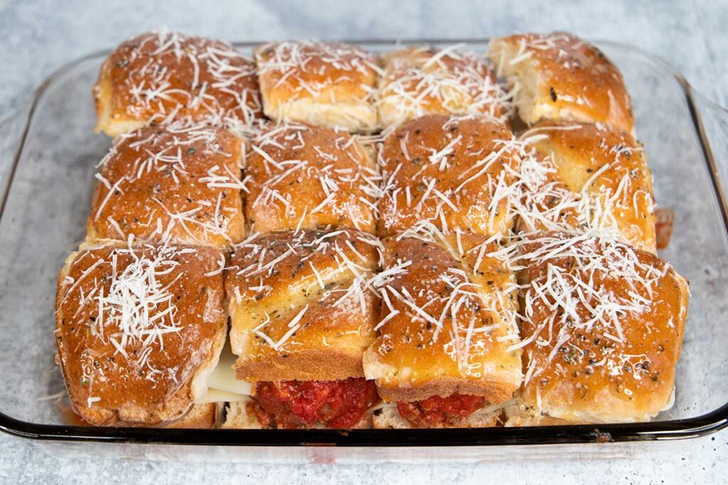 Assembled meatball sliders about to go into the oven.