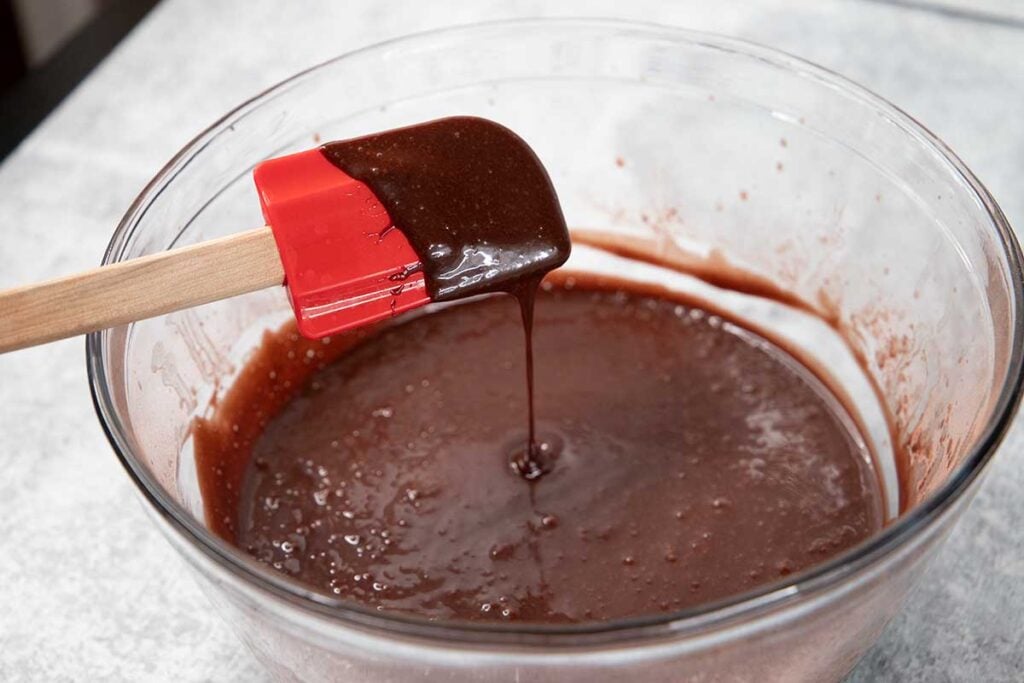 chocolate cupcake batter in a glass bowl