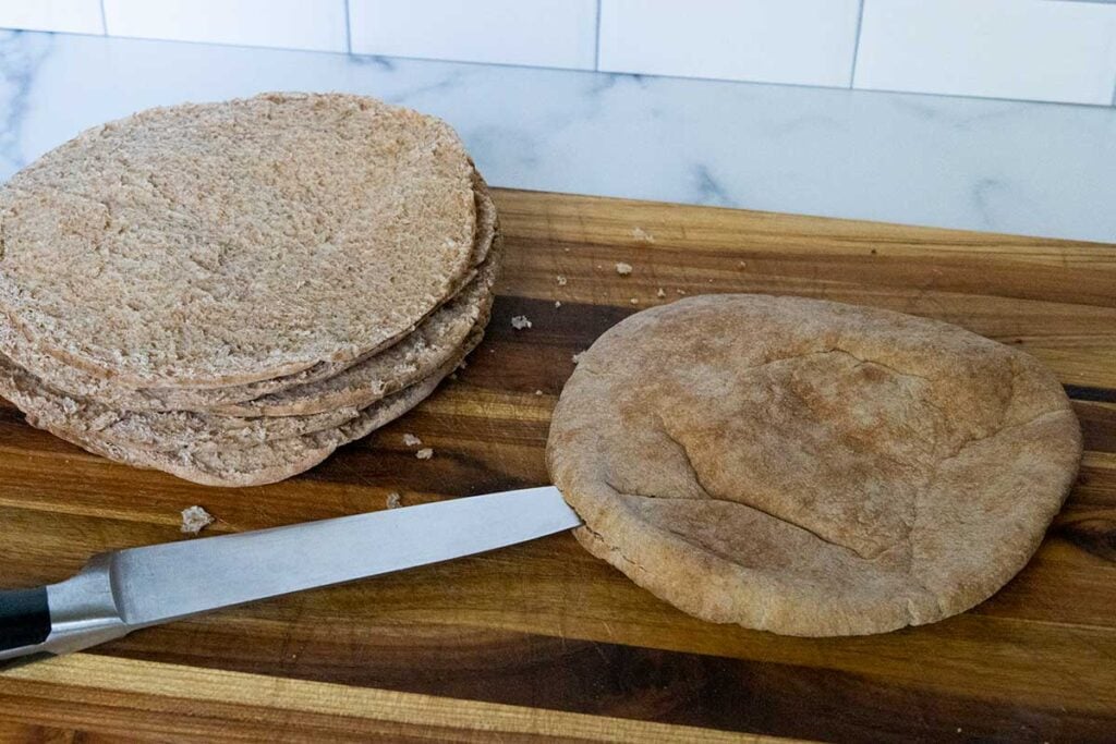 Cutting a pita into two pieces