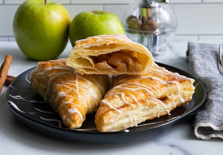 apple turnovers on black plate