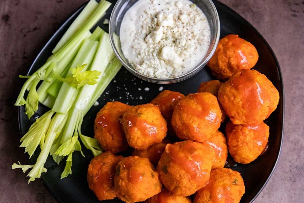 buffalo chicken meatballs with celery and blue cheese